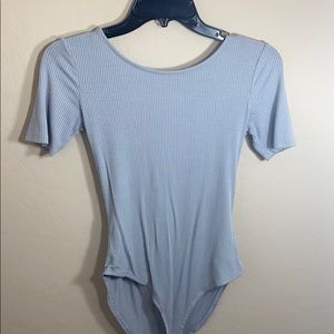 Violet colored body suit